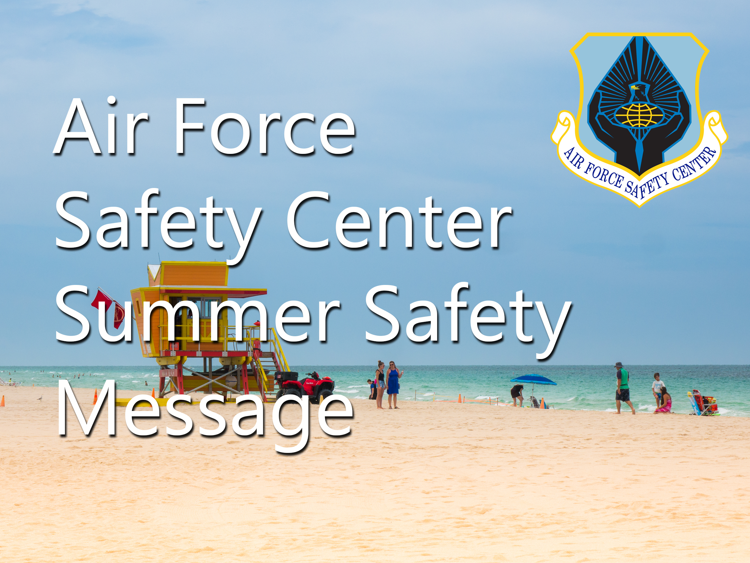 Air Force Safety Center Summer Message- Beach with lifeguard stand with people on beach